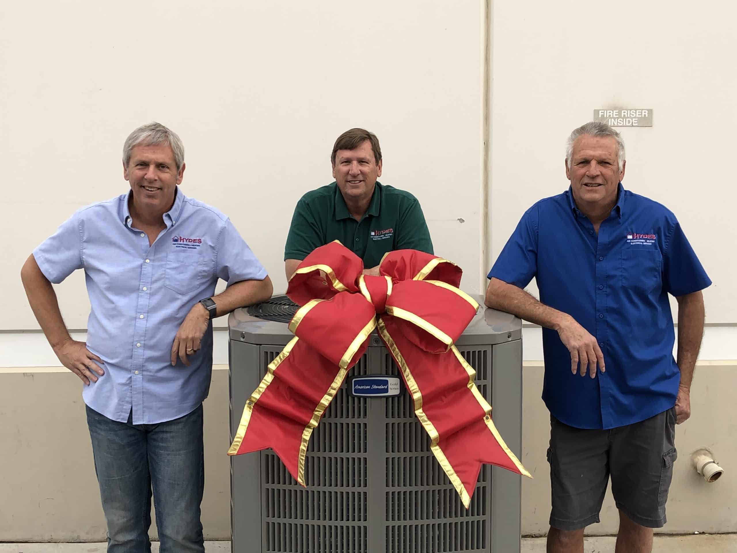 Hydes Brothers in front of Gift of Cooling HVAC system Giveaway