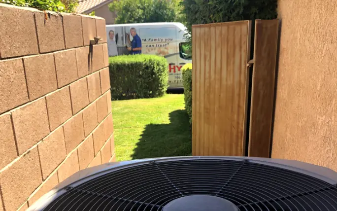 AC unit with truck in foreground