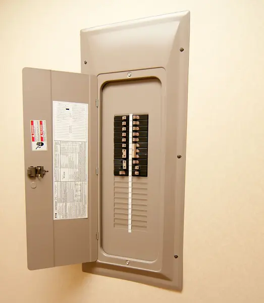 Electrical Panel On A Tan Wall.png